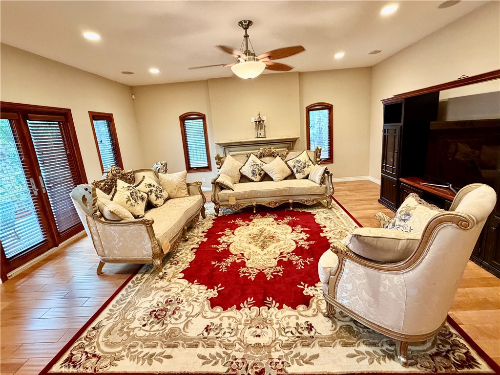 Formal living room at 116 Termino with fireplace and courtyard access
